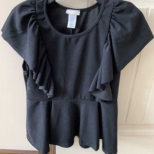 Cute black flirty top. Size L but fits more like a medium.